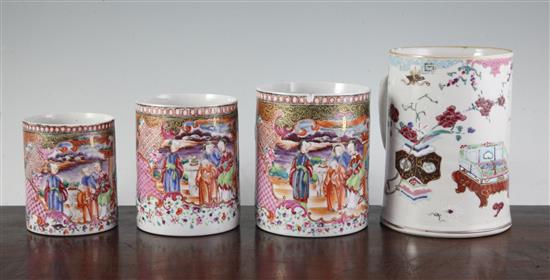 A graduated set of three Chinese export famille rose mugs and another larger, Qianlong period, 10cm-13cm and 16.5cm (4)